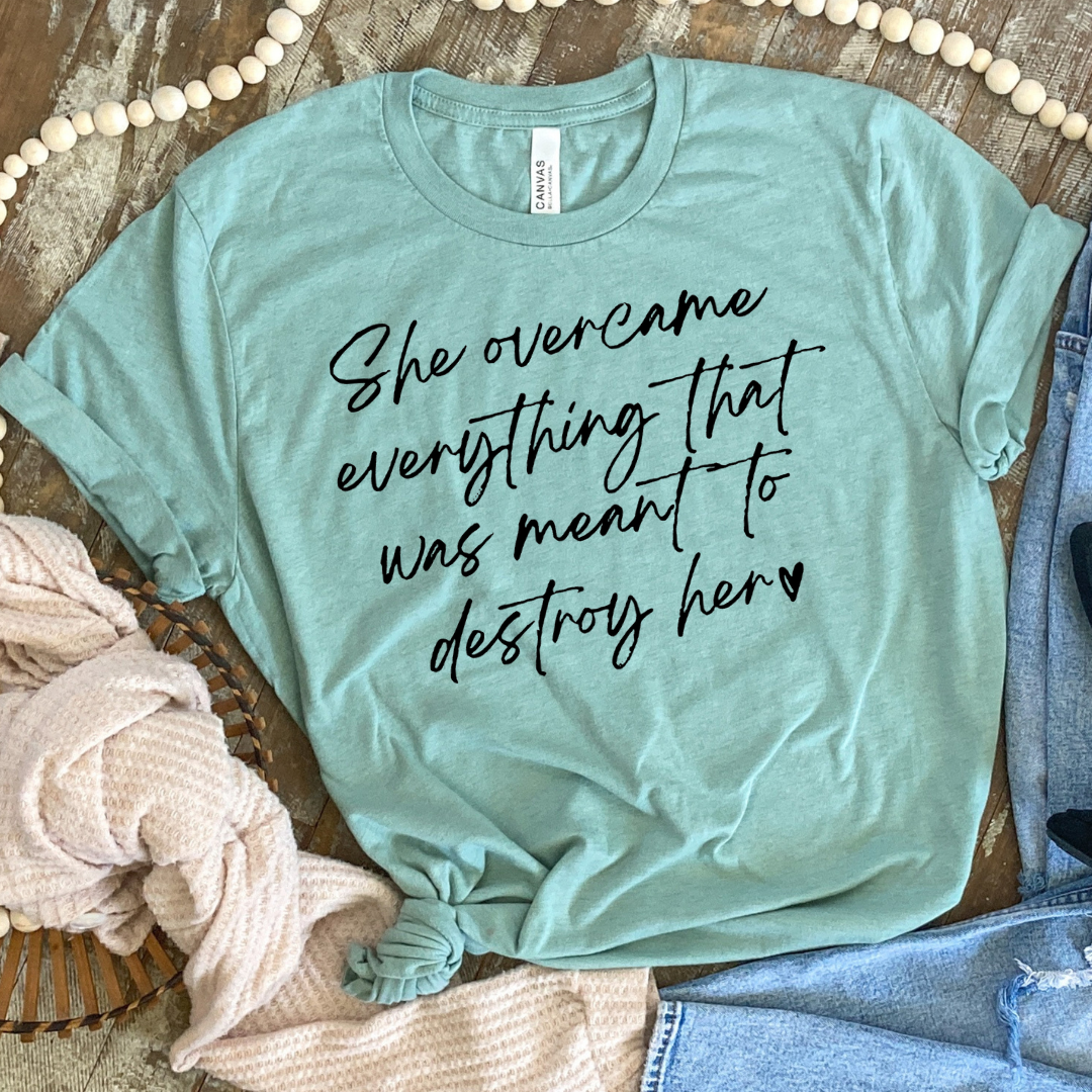 She Overcame Everything Strong Woman Graphic Tee