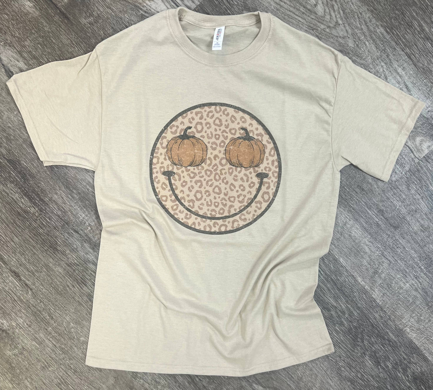 Pumpkin Happy Face Animal Print On Sand Tee