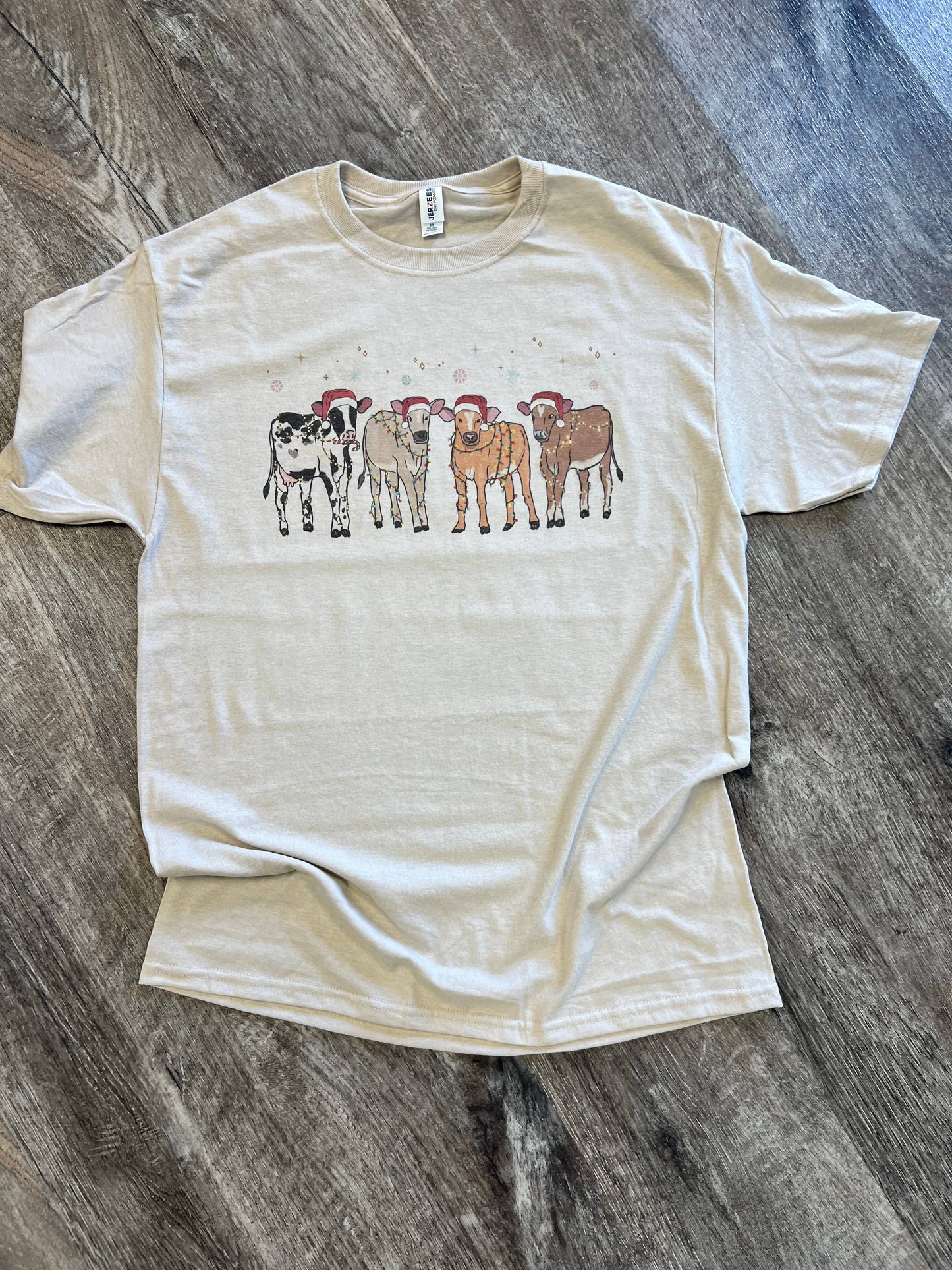 Cows with Christmas Hats and Lights On Sand Tee
