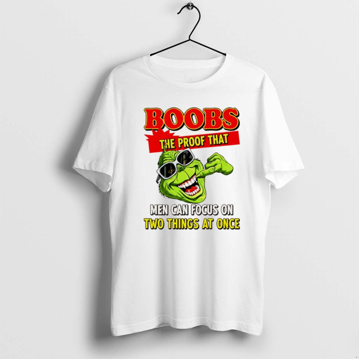 Official Grinch Boobs The Proof That Men Can Focus On Two Things At Once Christmas