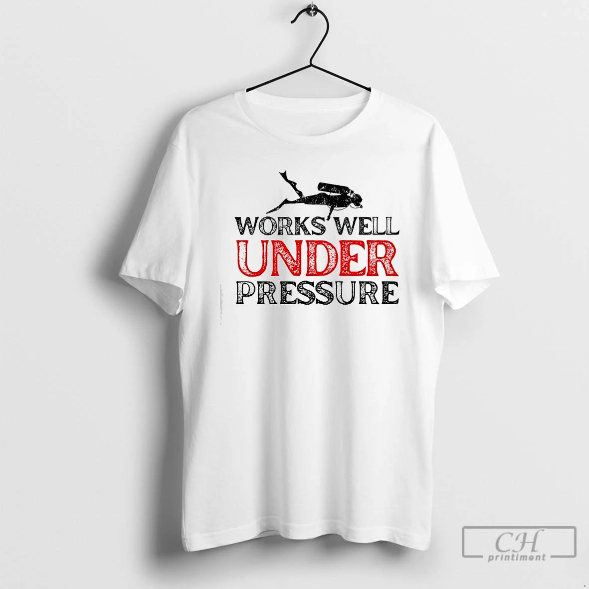 Premium Works Well Under Pressure A Silhouette Of A Scuba Diver