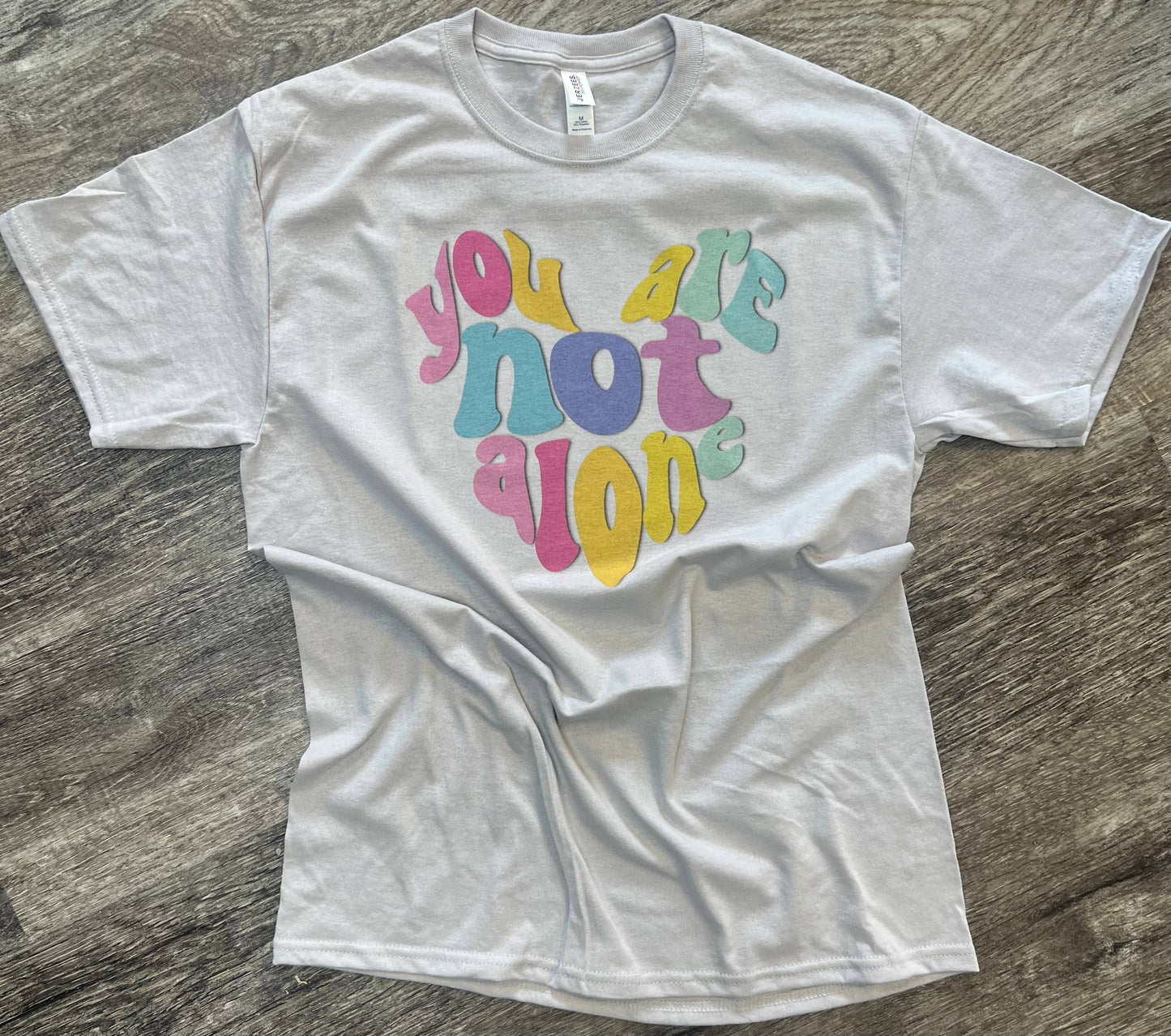 You Are Not Alone On Silver Tee
