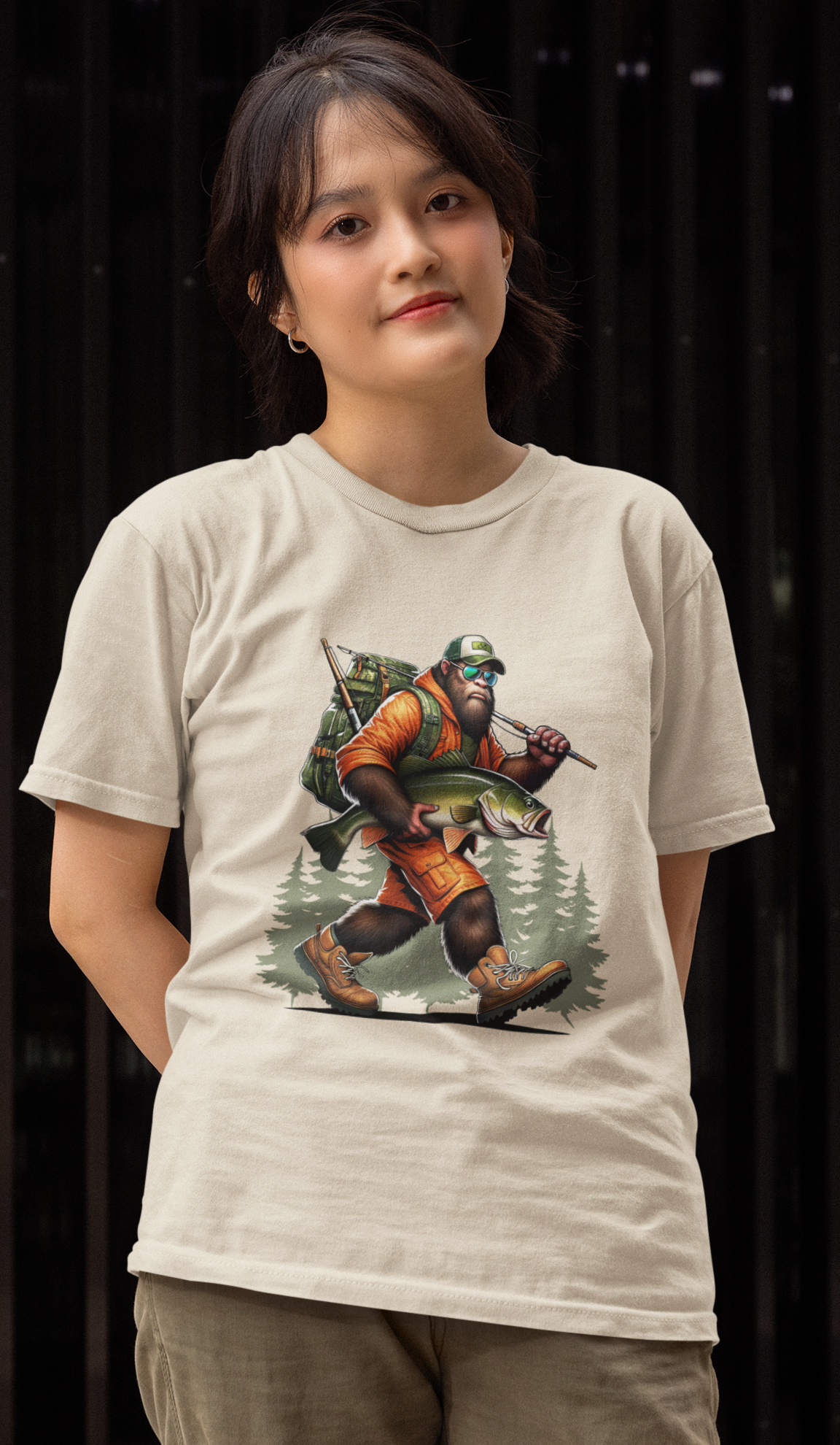 Fishing Bigfoot Carrying Fish T-Shirt (Tan)