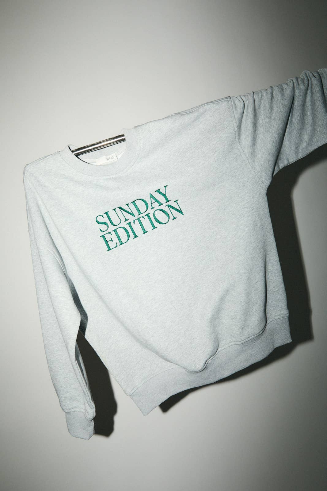 Round Neck Long Sleeve Graphic Embo Fleece Sweatshirt